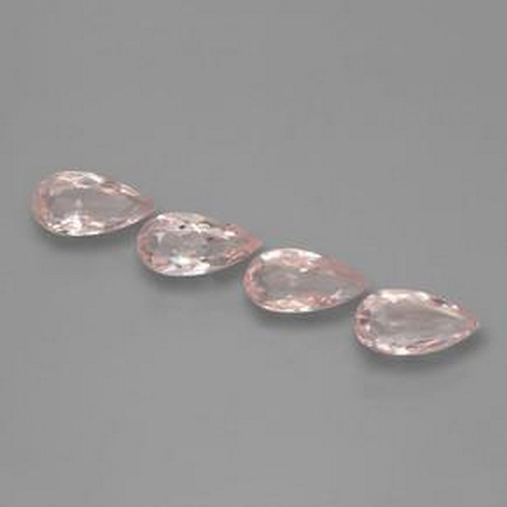 1ct Pear Cut Pink Morganite: 1ct Pear Cut Pink Morganite This lot contains 4 pear cut Morganite stones, each at 0.49ct Raw Dimension: 7.8 x 4 x 2.5mm Total Carat Weight: 1.95ct Treated: No Please view photos for