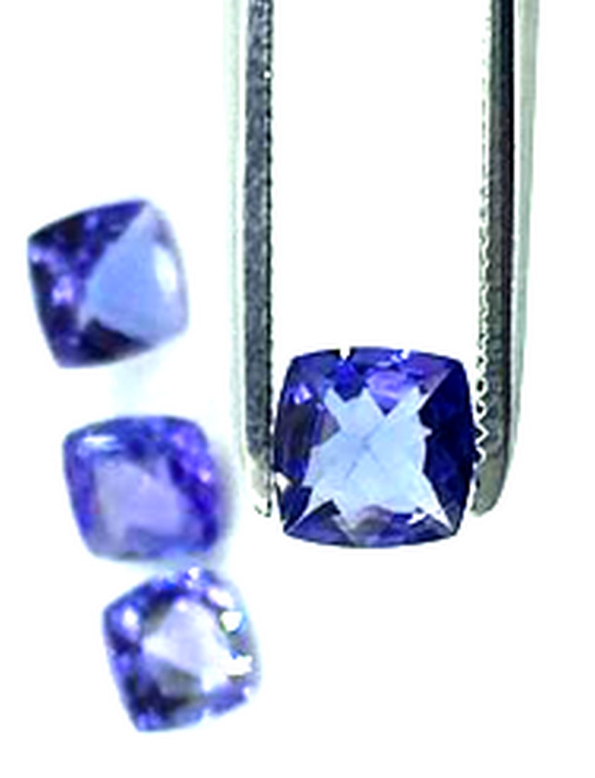 Lot Of 4 Cushion Cut Tanzanite Gemstone 2.58 Carat Total Weight: Lot Of 4 Cushion Cut Tanzanite Gemstone 2.58 Carat Total Weight Tanzanite is a rare and precious gemstone, which has been coined a 'geographical phenomenon' because of the unusual formation of