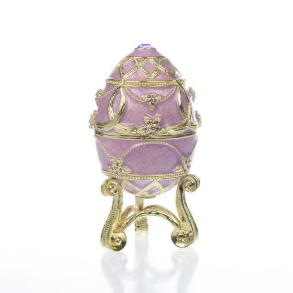 Purple Easter Egg with Flower Vase: Purple Easter Egg with Flower Vase A splendid handmade purple egg. This piece is a unique one-of-a-kind piece made for art lovers who get inspired by beautiful things. Dimensions: H 4.76 x W 2.4 x L 2