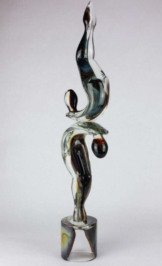 "Dancers" Chalcedony Sculpture in Murano Glass: "Dancers" Chalcedony Sculpture in Murano Glass This exclusive and one-of-a-kind glass sculpture features dancers crafted by hand in clear glass and chalcedony. Each piece is meticulously creat
