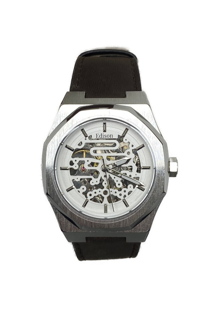 Mens Edison Brushed Stainless Steel Finish & Genuine Leather Band Skeleton Watch: Mens Edison Brushed Stainless Steel Finish & Genuine Leather Band Skeleton Watch. This Edison watch for men is crafted with impeccable detail. This watch features a octagon shape making it uniquel