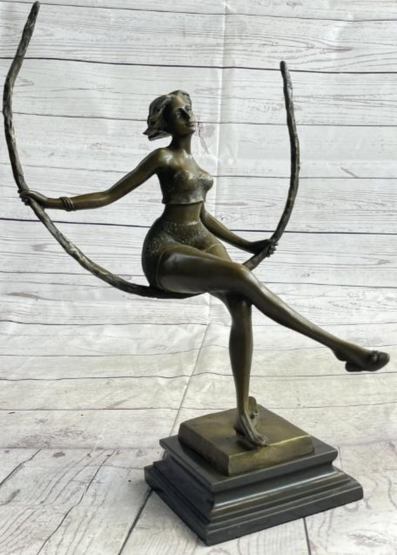 Moonlit Elegance: Sexy Woman on Swing Bronze Sculpture: Moonlit Elegance: Sexy Woman on Swing Bronze Sculpture Boldly sensual and gracefully poised, this bronze sculpture features a captivating woman seated on an abstract swing crafted from a sweeping half