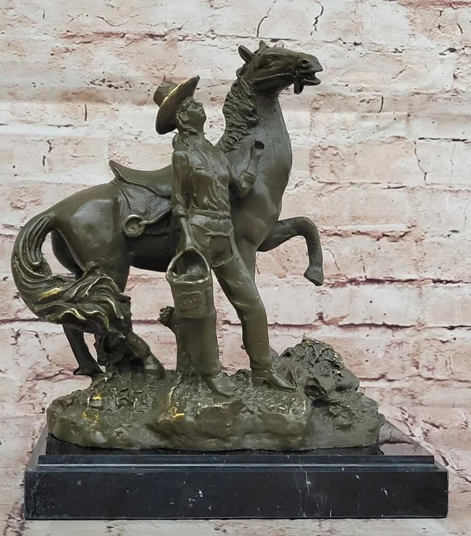 Western Horse Tamer Original Bronze Statue - 11.5" x 9.5": Western Horse Tamer Original Bronze Statue - 11.5" x 9.5" This evocative bronze sculpture captures a Western cowgirl standing beside her trusted horse, embodying the strength, grace, and resil
