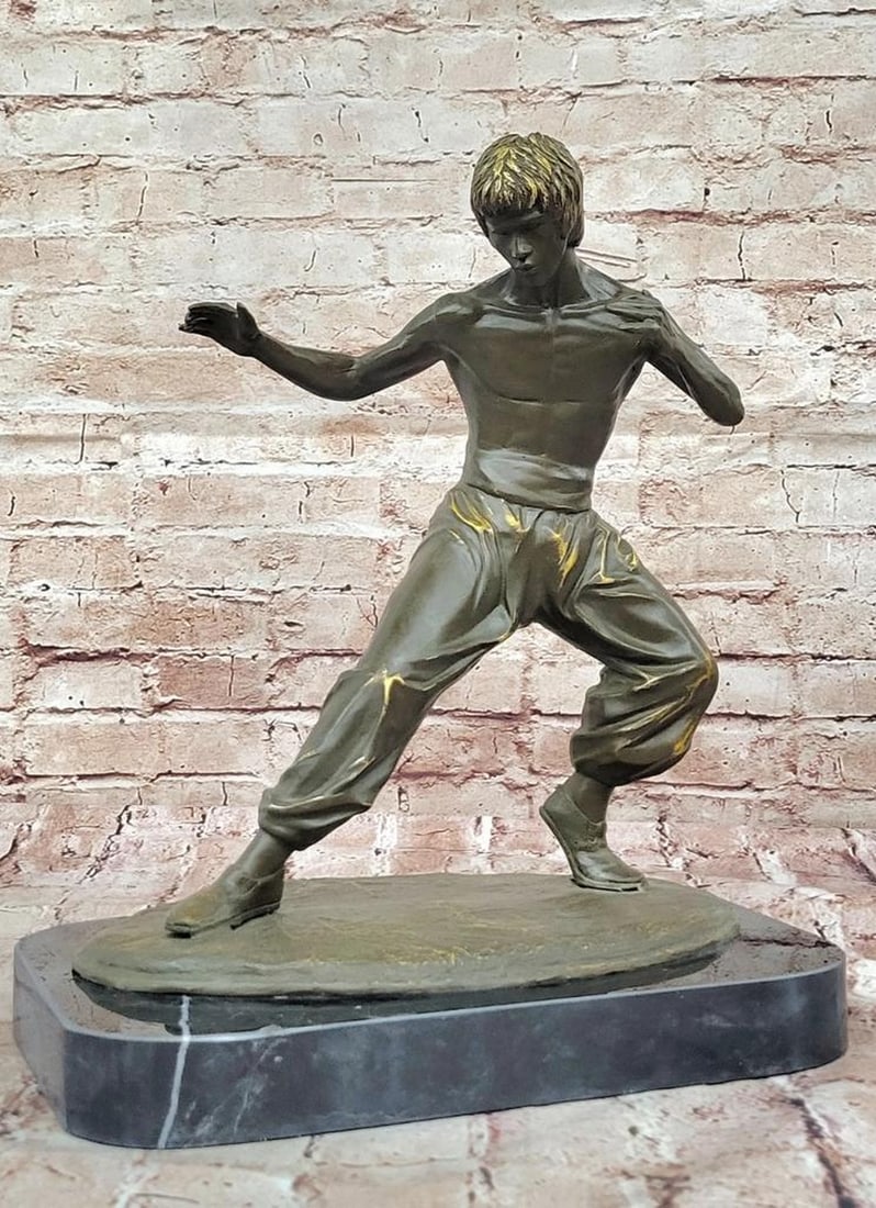 Bruce Lee Copper Martial Arts Sculpture by Mavchi - 15" x 12.5": Bruce Lee Copper Martial Arts Sculpture by Mavchi - 15" x 12.5" This limited edition copper sculpture by Mavchi captures the fierce spirit and enduring legacy of Bruce Lee in striking detail. 