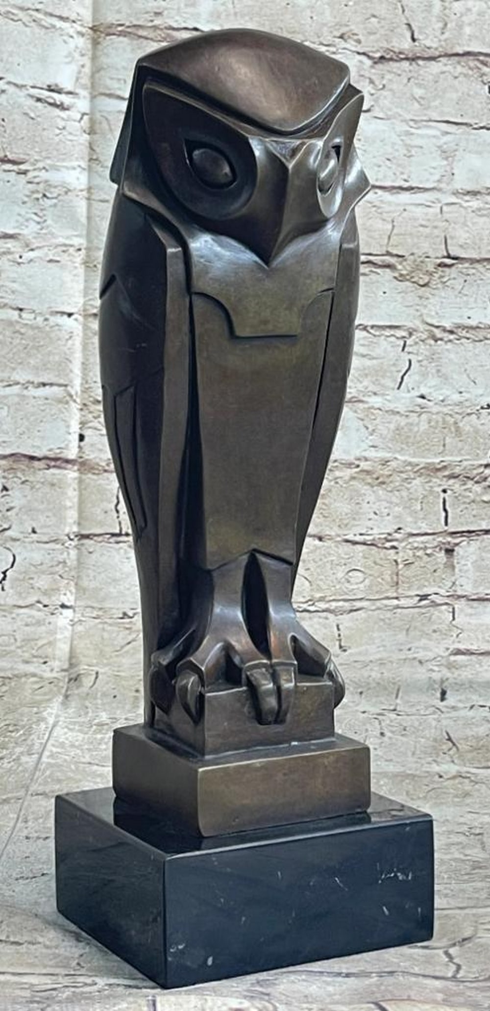 Enchanting Bronze Owl Sculpture Inspired by Salvador Dali - 14" x 5": Enchanting Bronze Owl Sculpture Inspired by Salvador Dali - 14" x 5" Experience the enchanting presence of this bronze owl sculpture, elegantly perched and gazing into the night sky. With its 