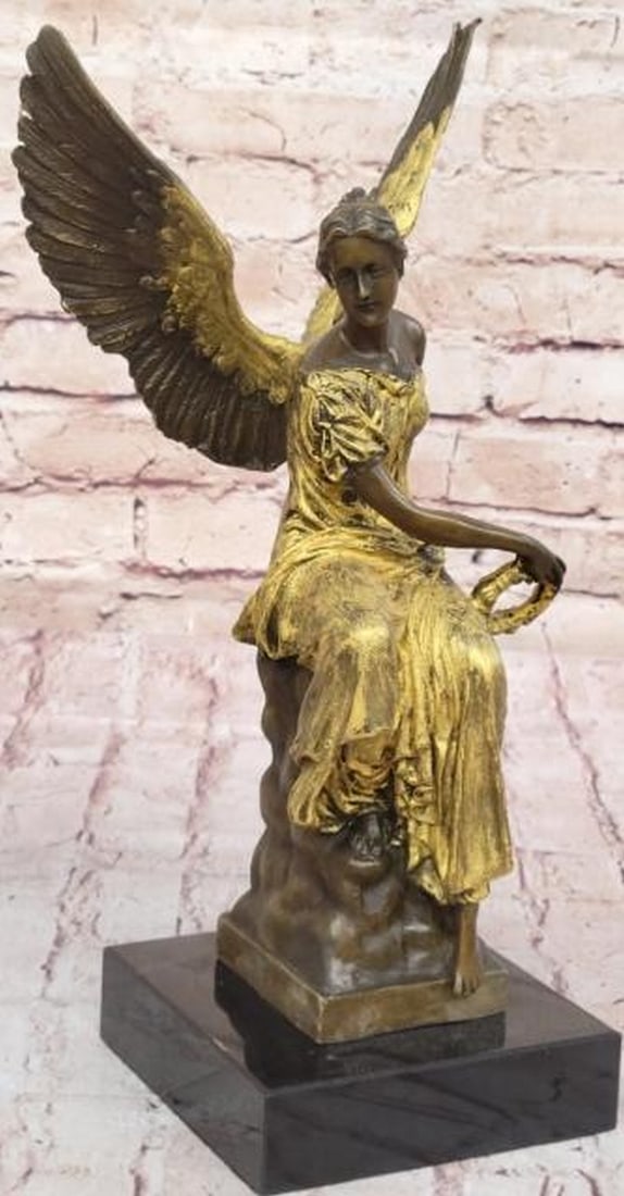 Houdon Inspired Graceful Golden Angel Bronze Sculpture On Marble Base - 12" x 7": Houdon Inspired Graceful Golden Angel Bronze Sculpture - 12" x 7" Perched upon her celestial throne, the mesmerizing angel contemplates the aftermath of a fierce earthly battle. Her graceful f