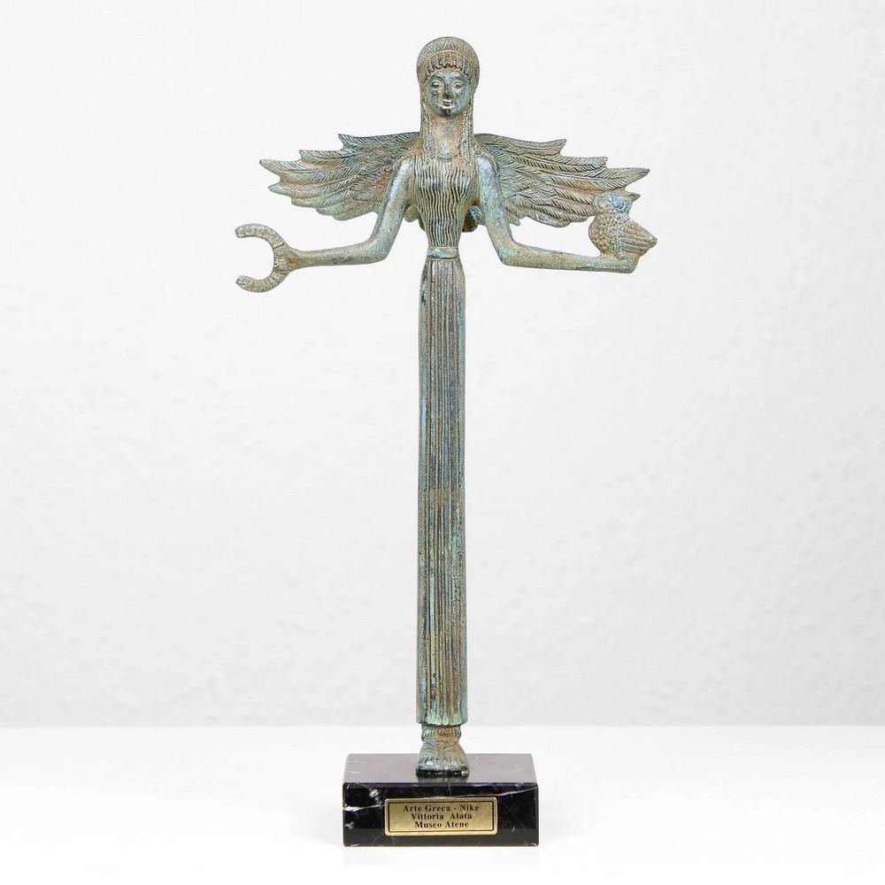 Bronze Statue of Nike Greek Goddess 11.5" x 6.1": Bronze Statue of Nike Greek Goddess 11.5" x 6.1" Nike, the goddess of victory, symbolized success in all fields, including art, music, war, and athletics. In Greek art, she is often depicted a