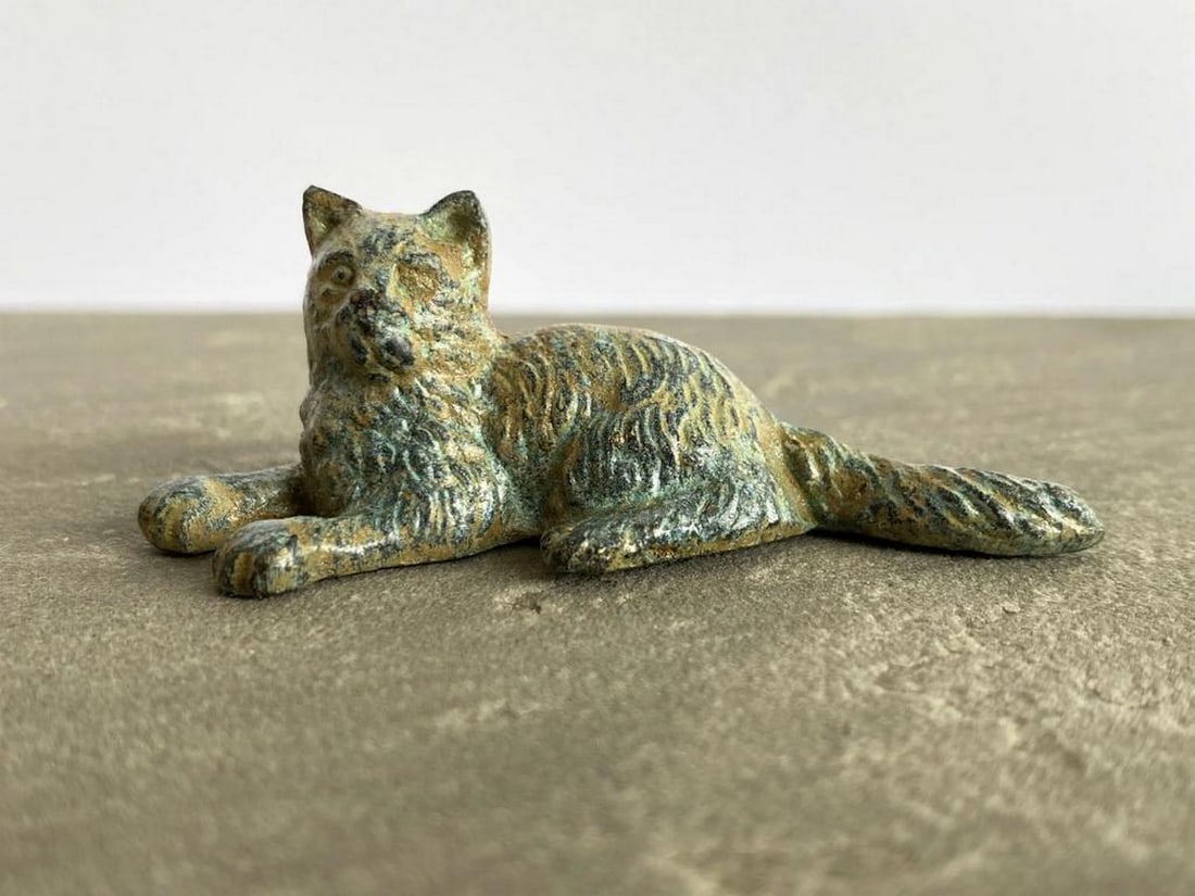 Lying Kitten Bronze Statuette in Aged Copper Finish - (0.9lbs): Lying Kitten Bronze Statuette in Aged Copper Finish - (0.9lbs) This sweet bronze kitten rests in a peaceful pose, brought to life with intricate carvings and a vintage green patina. Made from copper-z