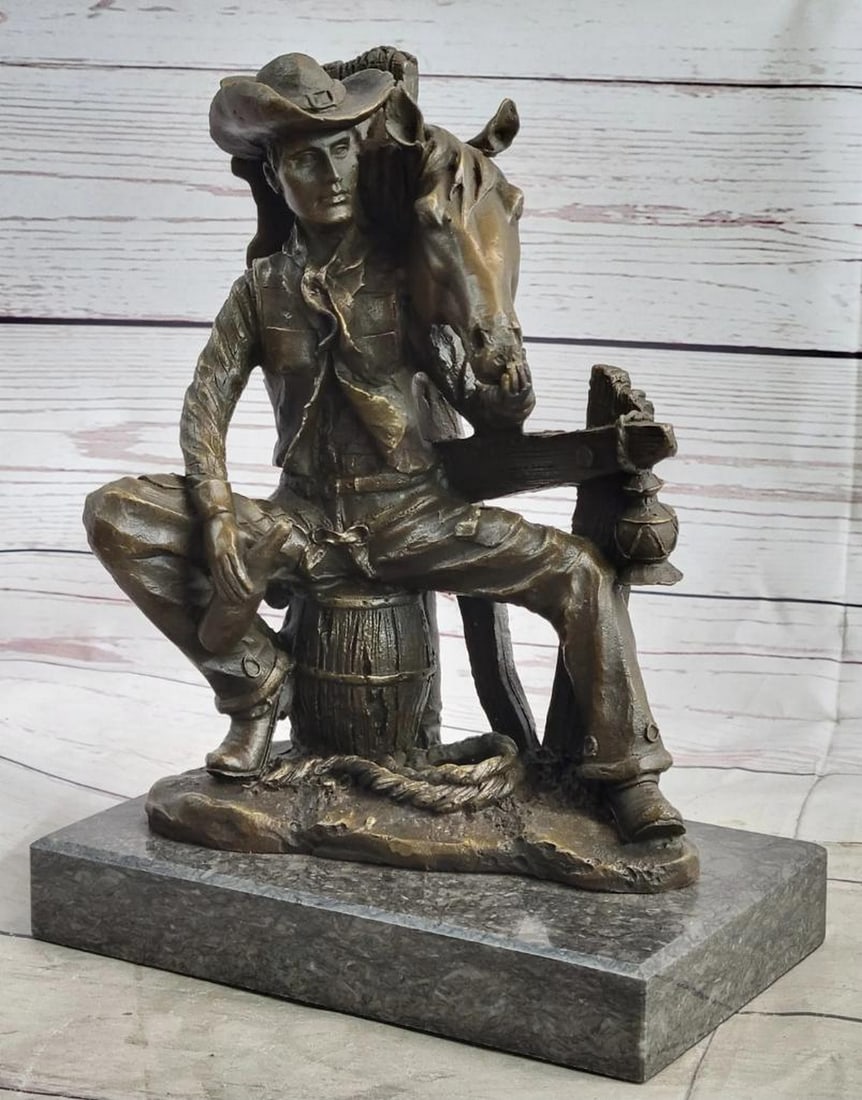 Cowboy & Horse Sitting Having a Drink Bronze Statue Sculpture Country Western: The Trusted Companions in this sculpture, a cowboy and his horse, are eager and ready to ride the trail together. this bronze figures are standing on rocky soil with a lucky Horseshoe . Cowboy has cha