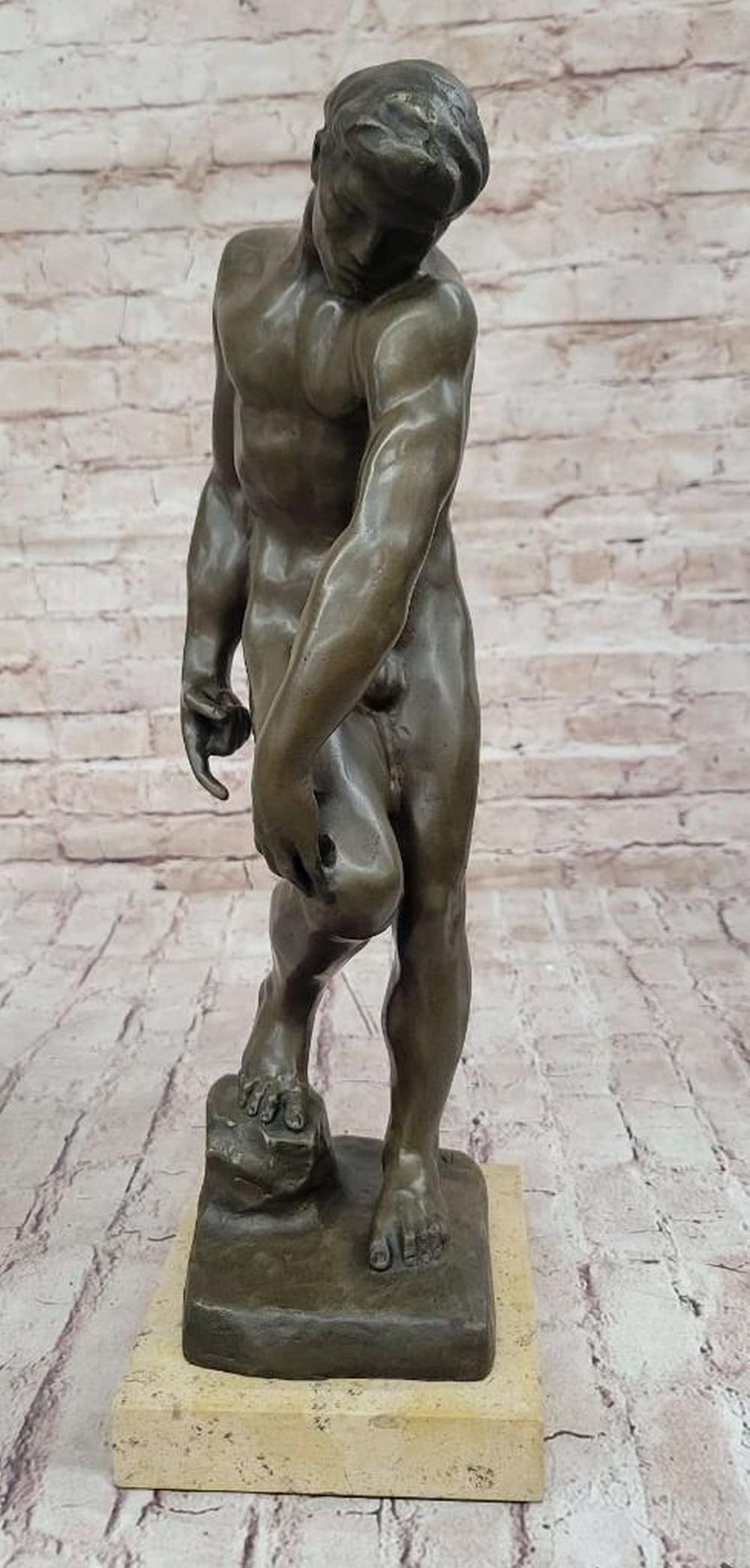 ADAM Bronze Reproduction on Marble Base: ADAM Bronze Reproduction on Marble Base A powerful reproduction of Auguste Rodin’s 1880 masterpiece Adam, this bronze sculpture captures the raw emotion and expressive form of one of the artist’s 