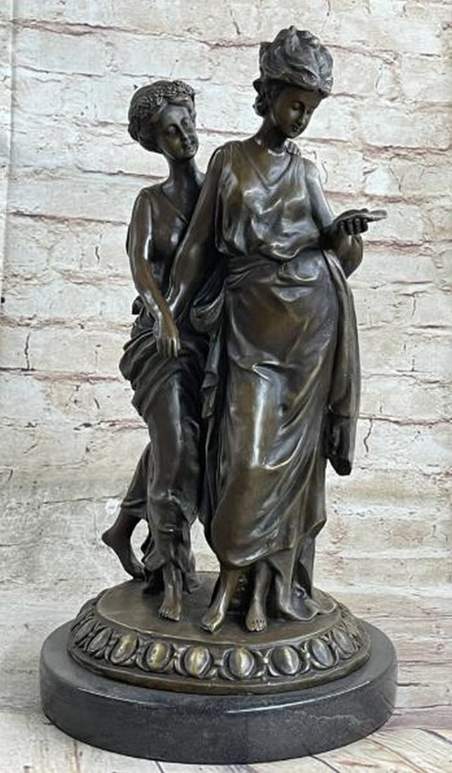 Whispers of Antiquity Bronze Greek Women Sculpture: Whispers of Antiquity Bronze Greek Women Sculpture Timeless and contemplative, this is an elegant bronze sculpture depicting two Greek women in a moment of shared intimacy and quiet focus. One figure 