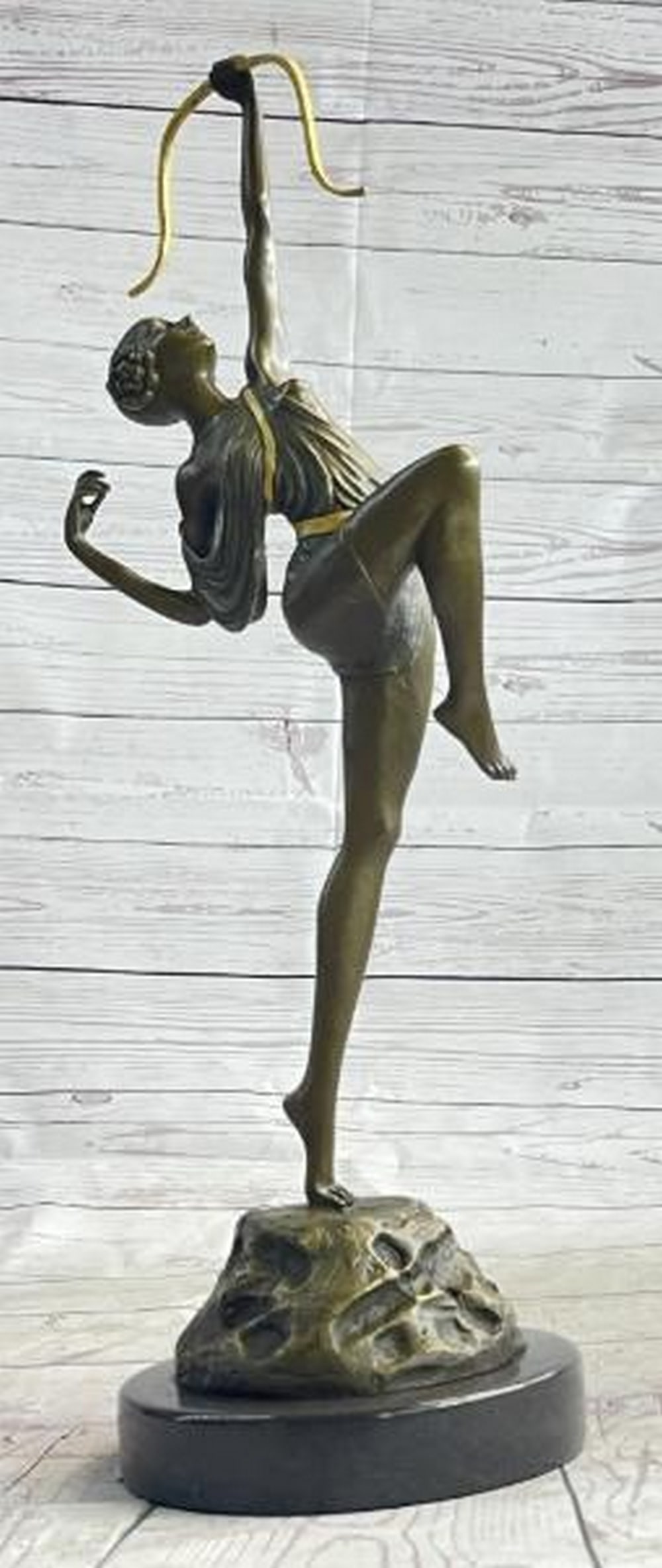Artemis Ascending: Semi-Nude Diana the Huntress Bronze Sculpture: Artemis Ascending: Semi-Nude Diana the Huntress Bronze Sculpture Power and grace converge in a stunning reproduction bronze statue of Diana the Huntress, goddess of the moon and wild things. Bearing t