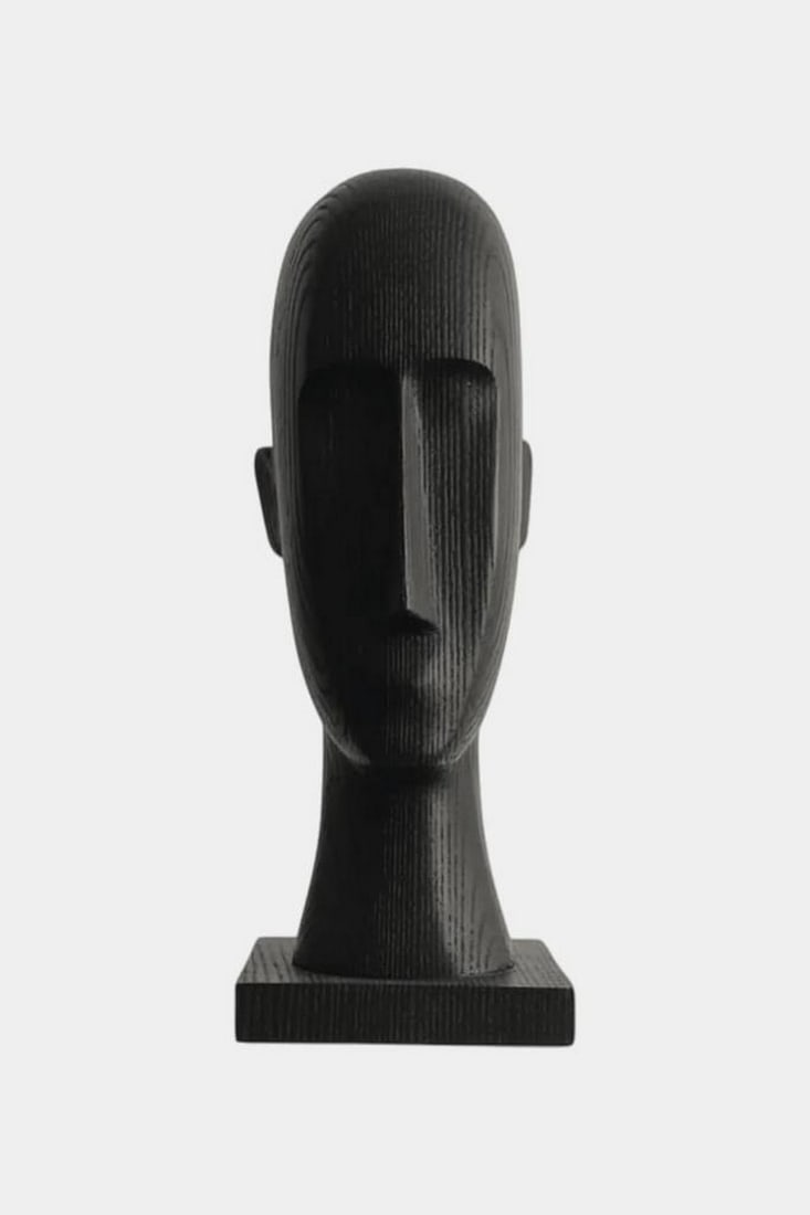 Still Form – Minimalist Wooden Head Sculpture: Still Form – Minimalist Wooden Head Sculpture A contemplative wooden sculpture that distills the human face into pure, elegant abstraction. With deep-set eyes, a prominent nose, and a smooth elongat