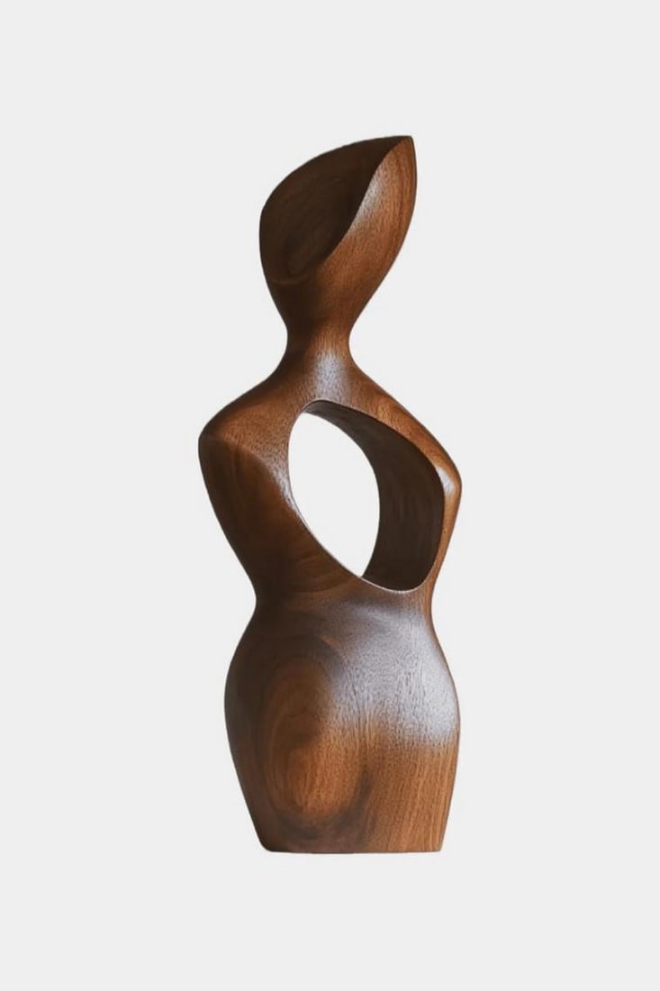 Whisper Form – Stylized Wooden Figure Sculpture: Whisper Form – Stylized Wooden Figure Sculpture An elegant wooden sculpture that captures the essence of human form through abstraction and fluid design. Carved with smooth curves and a hollowed cen