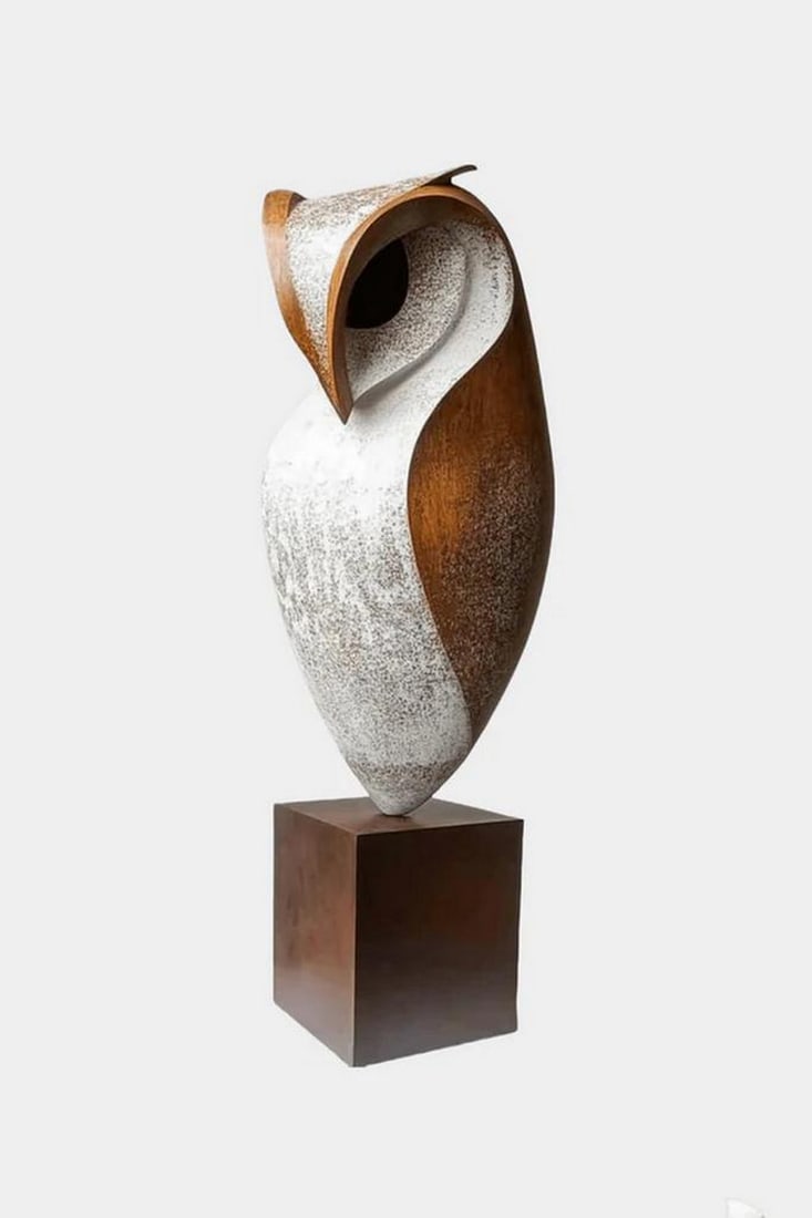 Wisdom in Grain: The Contemporary Owl Sculpture: Wisdom in Grain: The Contemporary Owl Sculpture This graceful wooden sculpture presents an owl in sleek, minimalist form—capturing the essence of wisdom and quiet power. Crafted with smooth,