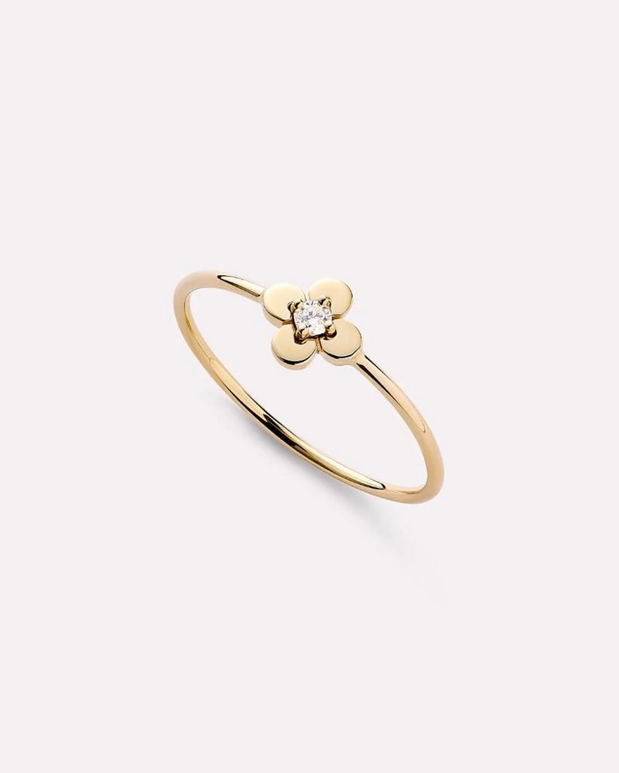 Solid Gold Flower Ring: Solid Gold Flower Ring This ring is crafted from recycled solid yellow gold with a slim band and a flower detail set with a lab-grown diamond. Its durable design is resistant to water and tarnish,