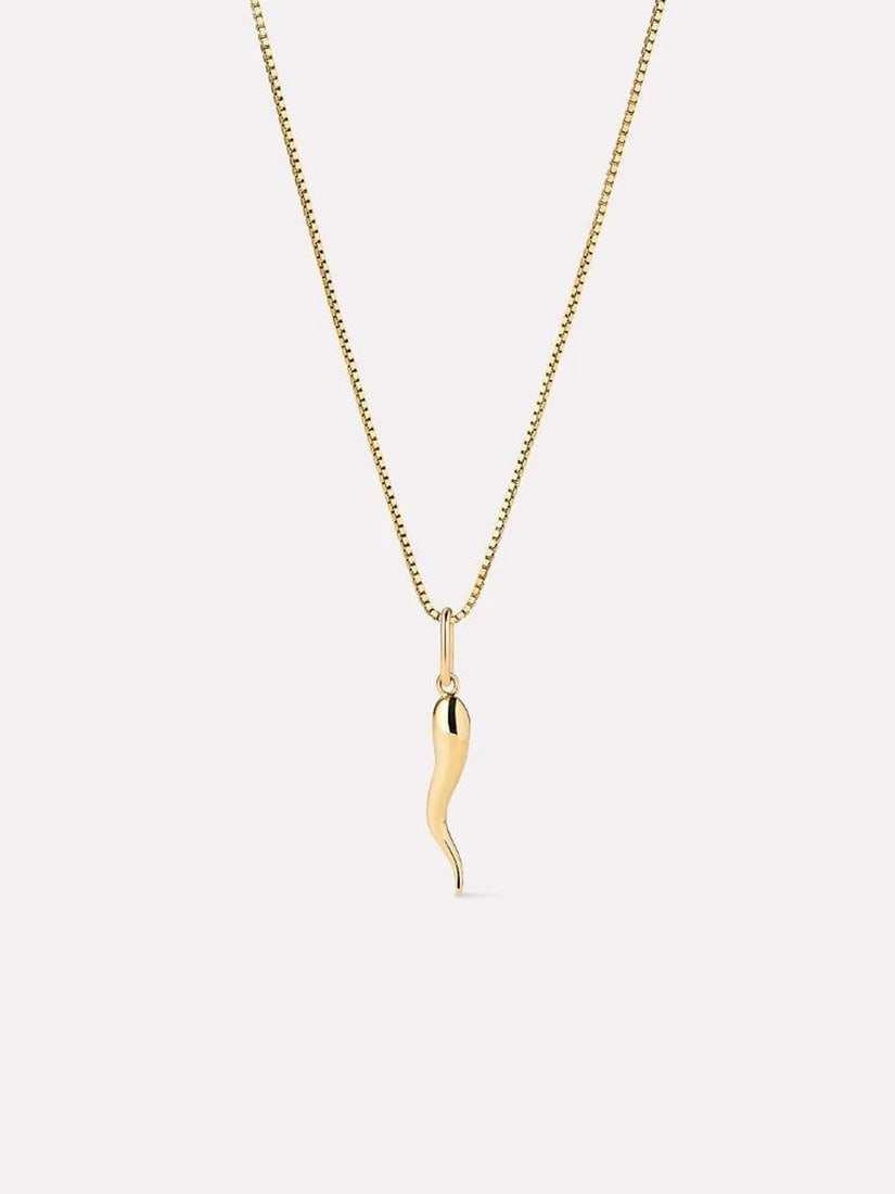 10K Solid Gold Italian Horn Charm Necklace: 10K Solid Gold Italian Horn Charm Necklace Add a touch of luck and timeless elegance to your stack with this solid yellow gold necklace set. Crafted in recycled solid gold, this piece features a sleek