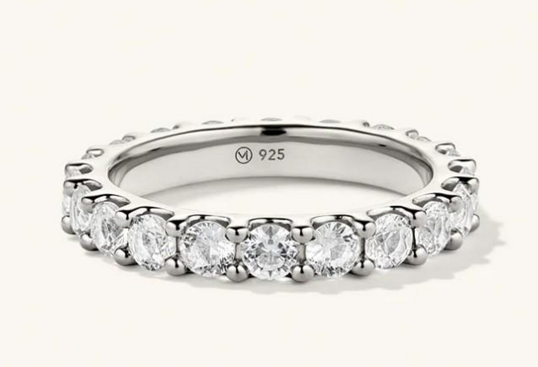 Aurora Sapphire Eternity Band: Aurora Sapphire Eternity Band The Aurora eternity ring features a continuous band of lab-grown sapphires. Each precision-cut stone is ethically crafted to capture the magic of natural light, set in a 