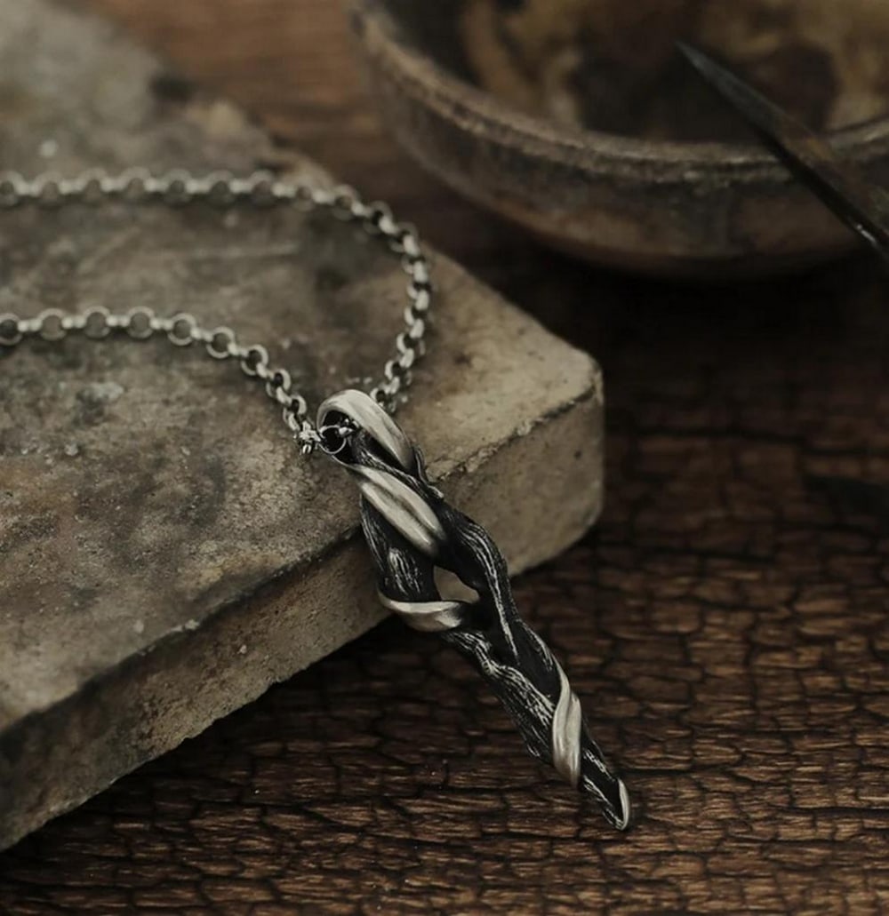 Driftwood Necklace: Driftwood Necklace Handcrafted in Mongolia, the Driftwood Necklace captures the organic beauty of nature through traditional artisanal technique. Carved and polished by hand, each piece channels the