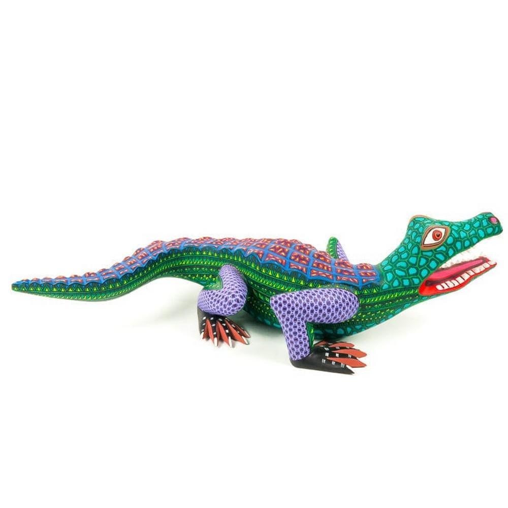 Large Alligator – Oaxacan Alebrije by Lauro Ramirez: Large Alligator – Oaxacan Alebrije by Lauro Ramirez Bold, powerful, and expertly rendered, this large alligator alebrije is a commanding piece of Oaxacan folk art. Hand-carved from a single block of