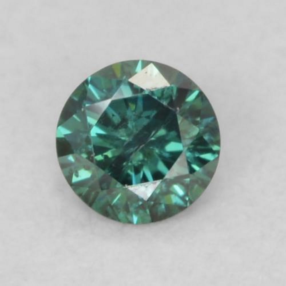 0.1 ct Castleton Green Diamond Gemstone: 0.1 ct Castleton Green Diamond Gemstone Introducing the Castleton Green Diamond Gemstone, a radiant masterpiece that effortlessly elevates your jewelry collection. Its mesmerizing green hue,