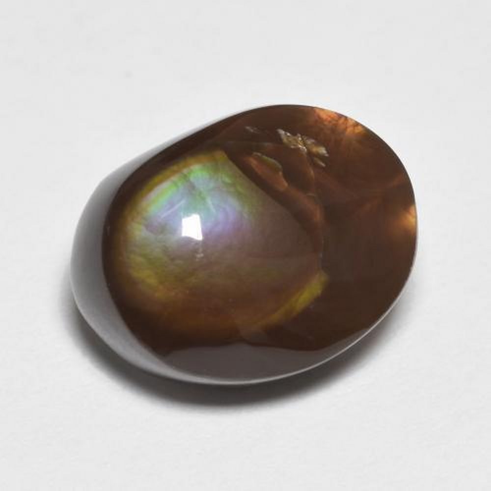 Multicolor Fire Agate: Fancy Multicolor Fire Agate This gemstone produces iridescence. This is one of the most mesmerising optical effects seen in gemstones. Agates are well known for their grounding and stabilizing influen