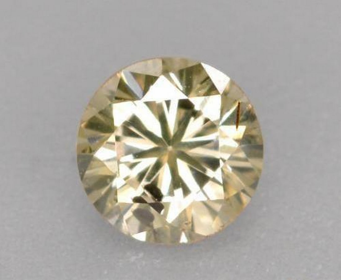 0.2ct Champagne Yellow Diamond-Cut Gemstone: 0.2ct Champagne Yellow Diamond-Cut Gemstone This 0.2ct champagne yellow diamond-cut gemstone offers a warm, golden hue with brilliant facets, ideal for adding subtle elegance to your designs. Type: Di