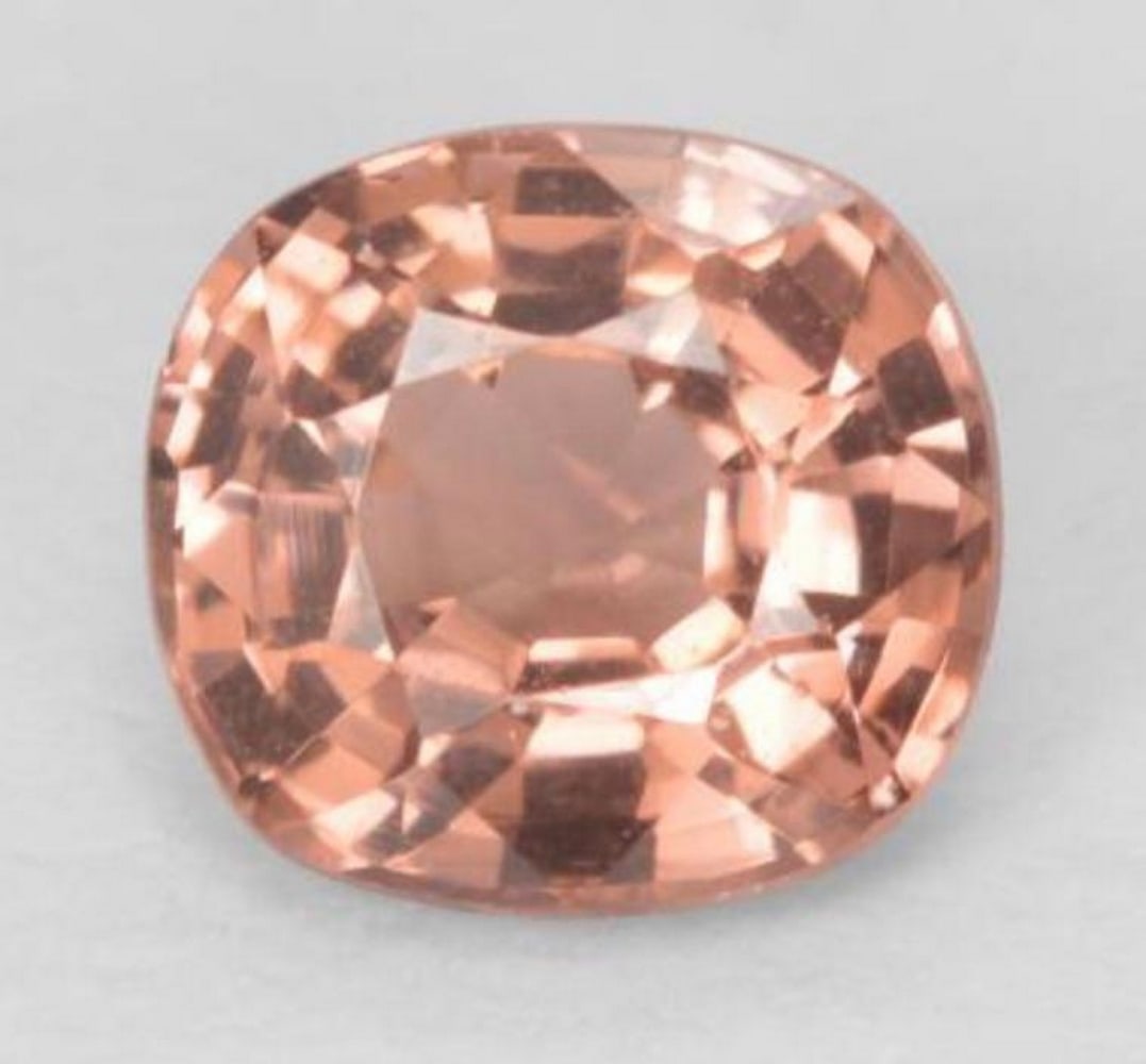 0.5ct Peach Pink Spinel Gemstone: 0.5ct Peach Pink Spinel Gemstone Size: 5 x 4.7 x 3mm Shape: Cushion Cut Colour: Medium Peach Pink Clarity: VVS-VS Untreated Origin: Tanzania Mohs Hardness: 8 View Photos For Further Details