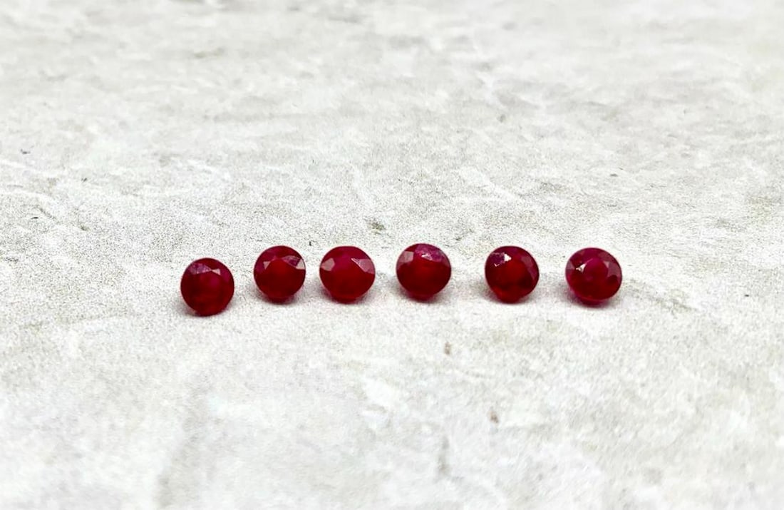 Lot Of 6 Round Facet Rubies: Lot Of 6 Round Facet Rubies Perfect for jewelry-making, collections, or custom designs, these rubies add a touch of luxury and elegance to any project. Their uniform shape and exceptional sparkle
