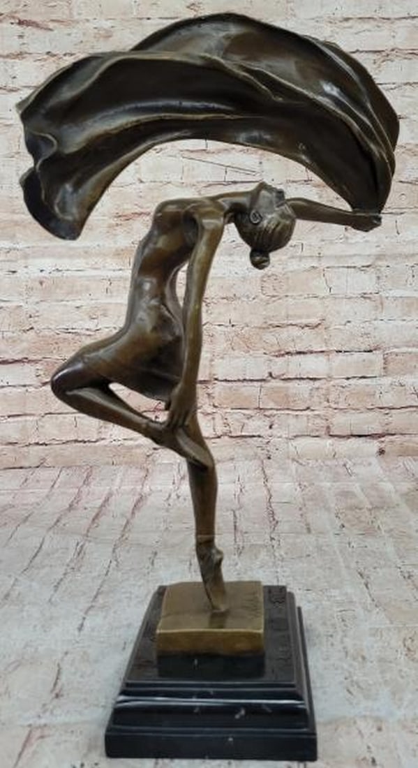Serenade in Motion Bronze Sculpture: Serenade in Motion Bronze Sculpture This mesmerizing bronze sculpture, bearing the signature of artist Aldo Vitaleh, captures a moment of pure, expressive dance. The figure of a graceful girl is froze