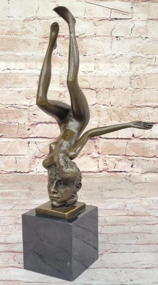 Dual Essence Bronze Sculpture: Dual Essence Bronze Sculpture This provocative and thought-provoking bronze sculpture, bearing the signature of artist Nick, explores themes of identity, connection, and duality. The artwork features 