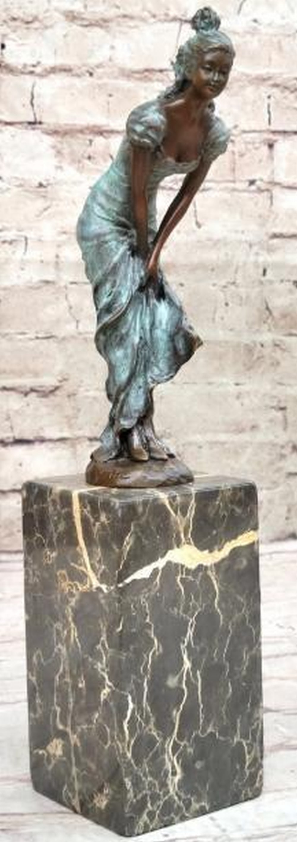 Art Deco Grace Blue Patina Bronze Bookend Sculpture: Art Deco Grace Blue Patina Bronze Bookend Sculpture A stunning blend of elegance and function, this is a bronze bookend sculpture featuring a poised woman in a flowing, body-hugging dress with a delic