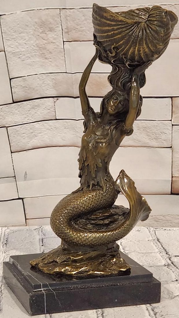 Annie Mermaid Candle Holder Original Bronze Sculpture - 11" x 5.5": Annie Mermaid Candle Holder Original Bronze Sculpture - 11" x 5.5" This bronze sculpture depicts a mermaid in a poised, flowing composition, incorporating a candle holder into its design. The 