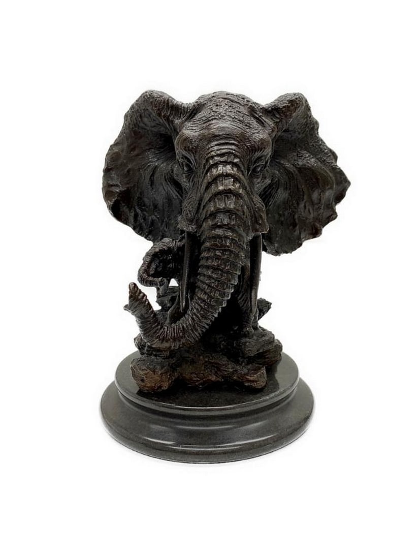 Massive Elephant Head Bust Bronze Sculpture: Massive Elephant Head Bust Bronze Sculpture This is a striking sculpture of the massive elephant. Adding emphasize to the immensity of a real elephant the artist crafted its head much large then the r