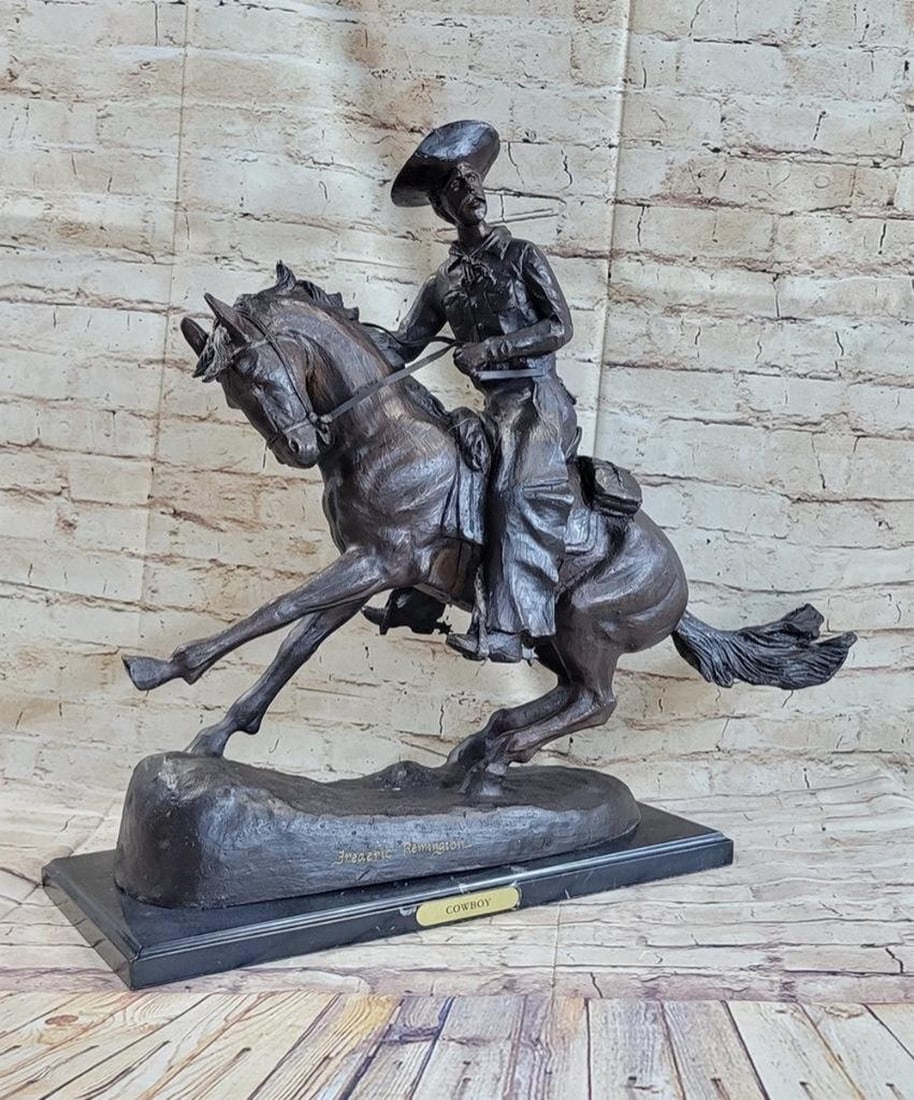 Remington Inspired Western Cowboy Rodeo Bronze Sculpture: Remington Inspired Western Cowboy Rodeo Bronze Sculpture A seasoned cowboy is casually patrolling the area, when suddenly something catches his attention. He yanks on the reins, pulling the horse back