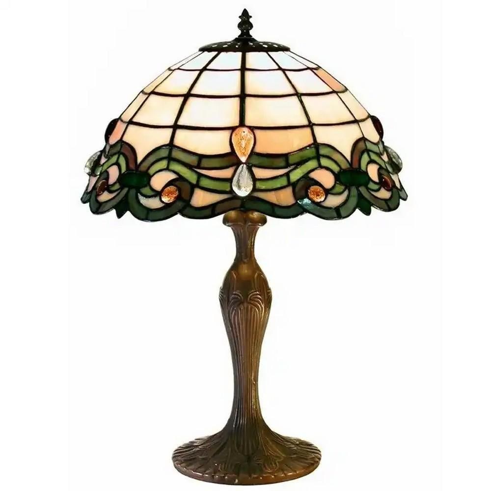 Tiffany-Inspired Vintage Stained Glass Table Lamp: Tiffany-Inspired Vintage Stained Glass Table Lamp Illuminate your space with this elegant Tiffany-style table lamp, featuring a stunning stained glass shade in muted tones that seamlessly complements 