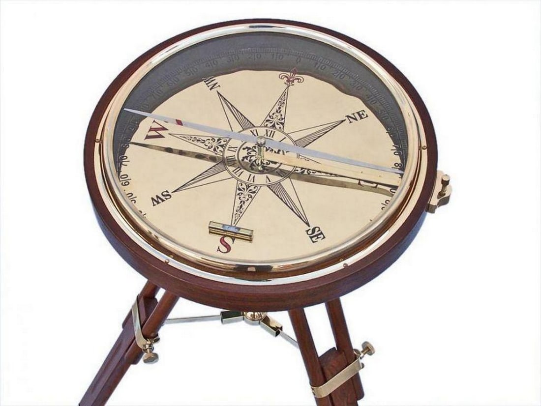 Decorative Wooden Brass Compass Table 23": Decorative Wooden Brass Compass Table 23" Exotic yet practical, The Decorative Wooden Brass Compass Table 23" will add an eclectic touch of world charm to your décor. This beautiful table fea