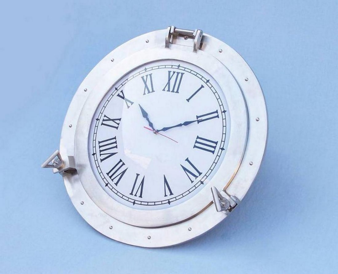 Brushed Nickel Deluxe Class Porthole Clock 24": Brushed Nickel Deluxe Class Porthole Clock 24" The Brushed Nickel Ship Porthole Clock 24" is a classy and quality accent piece to add to any nautical themed room. This charming vintage nautica