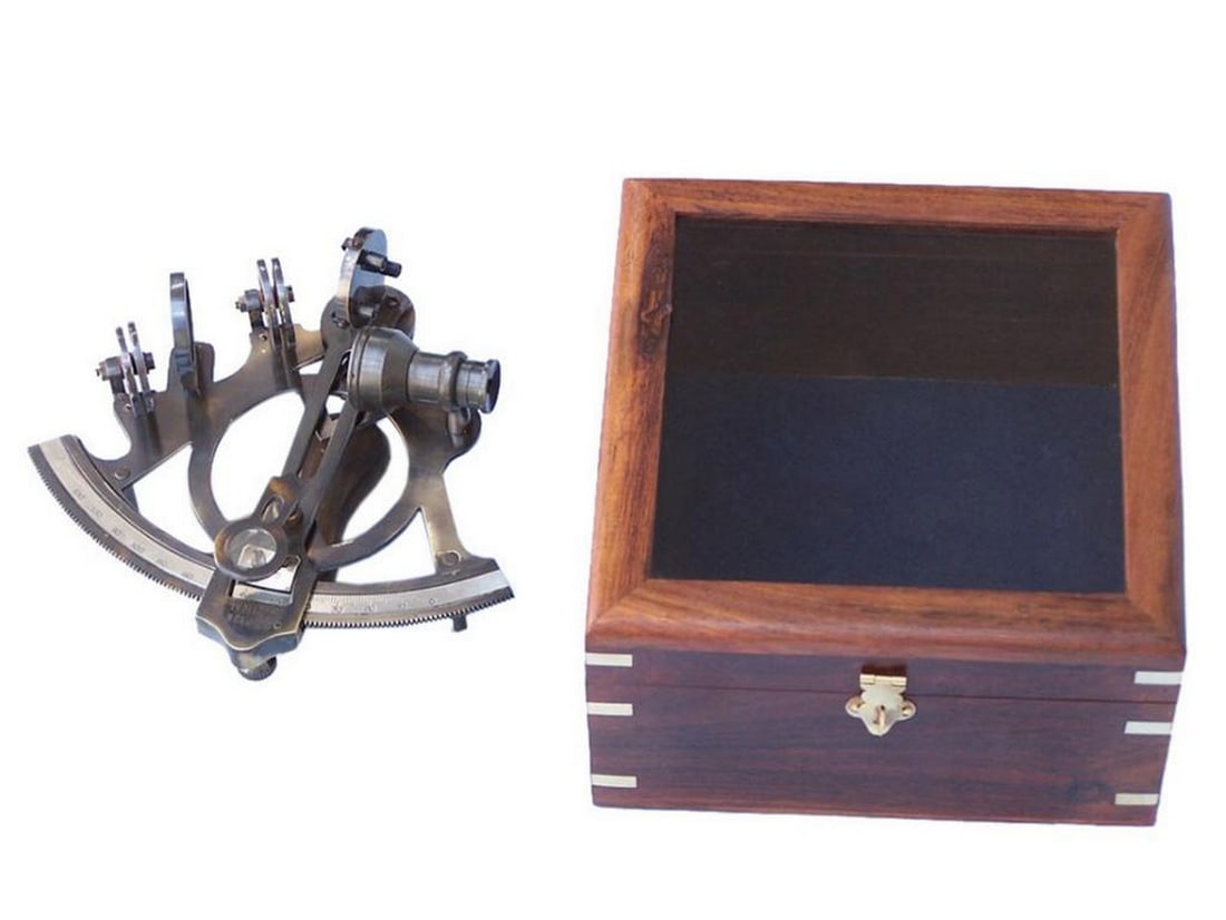 Brass Sextant with Rosewood Box 7": Brass Sextant with Rosewood Box 7" This beautifully crafted 7-inch antiqued brass sextant is a stunning tribute to maritime history. With its polished finish and glass optics, it serves as both a 