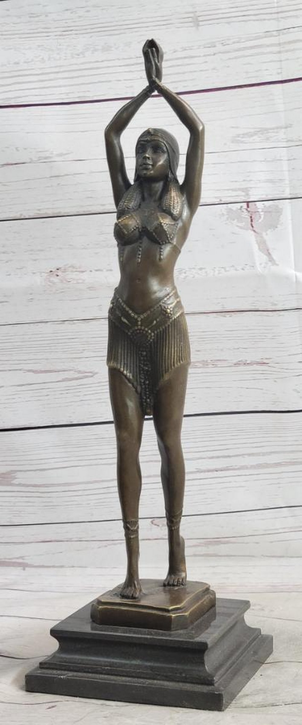 Chiparus Semi Nude Art Deco Belly Dancer Bronze Sculpture – 17" x 4.5": Chiparus Semi Nude Art Deco Belly Dancer Bronze Sculpture – 17" x 4.5" This bronze sculpture portrays a semi-nude belly dancer with arms crossed above her head, poised gracefully on tiptoe. 