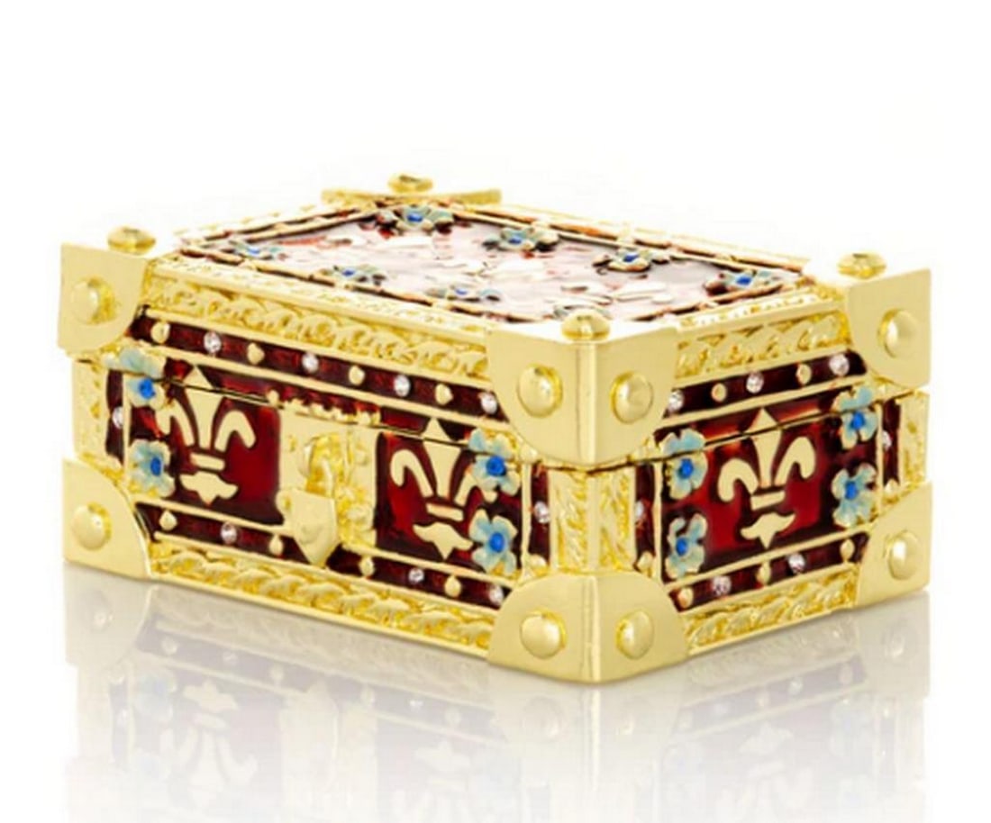 Keepsake Treasure Chest Trinket Box: Keepsake Treasure Chest Trinket Box This enamel-painted trinket box, plated with either 24K gold or 925 silver, features handpicked Austrian crystals artistically placed on each piece. Equipped with a