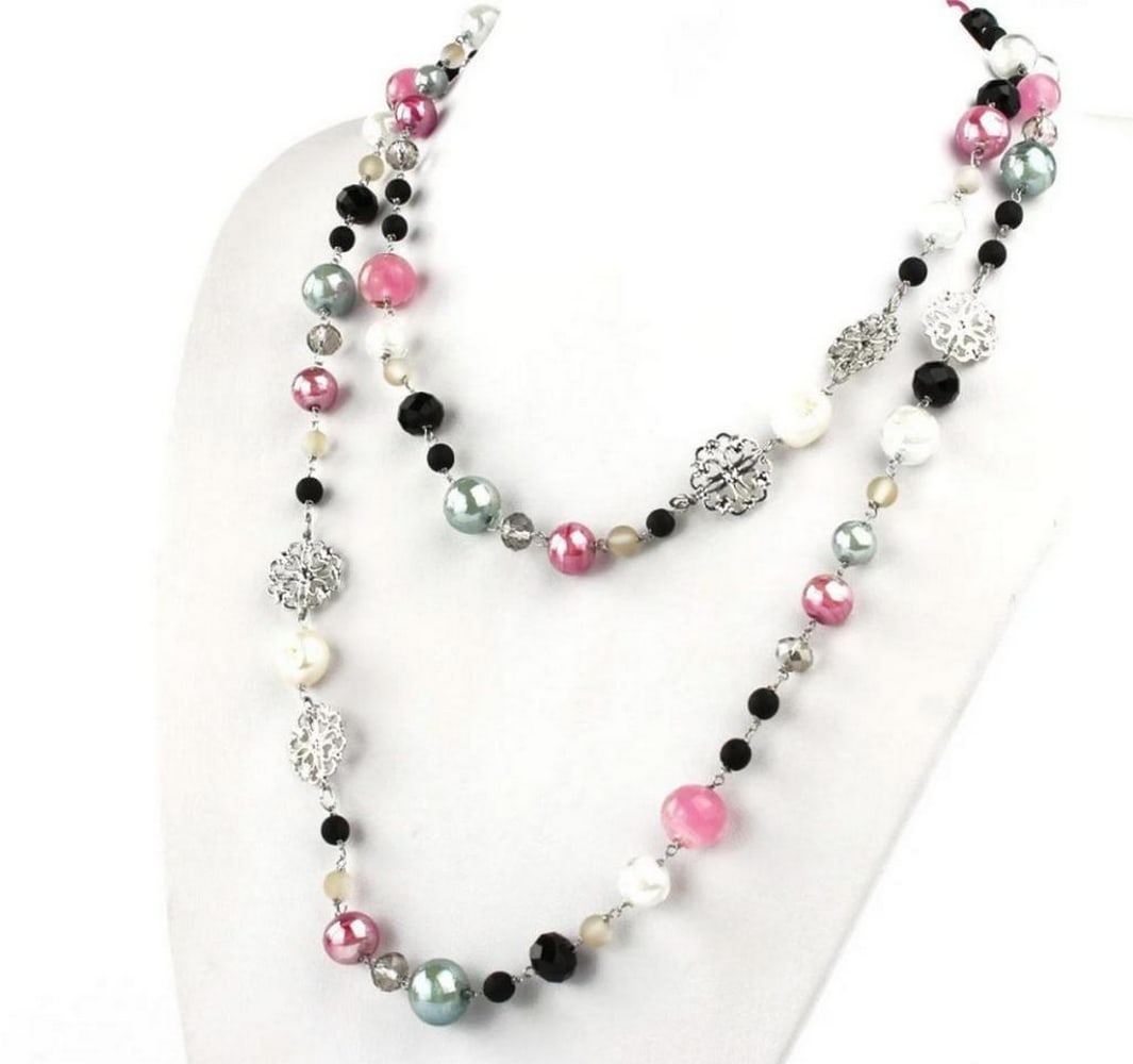 Double Lined Glass Beaded Necklace: Double Lined Glass Beaded Necklace This double necklace is made in lamp working technique, and each bead is worked as single piece. Beads are made in molten glass, so this necklace is a perfect jewels