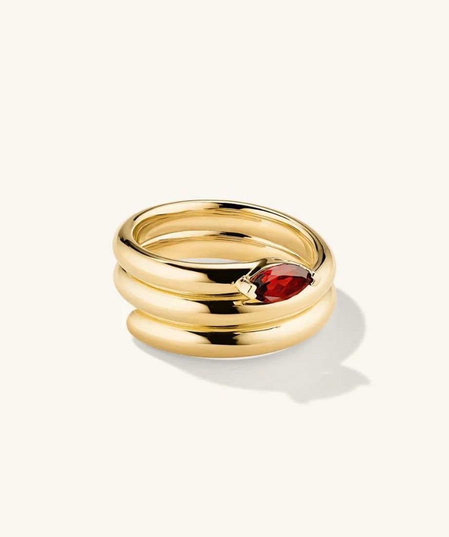 Serpent Garnet Gemstone Coil Ring: Serpent Garnet Gemstone Coil Ring Add this piece to your collection of bold statements. Handcrafted in 18k gold vermeil. Not to be confused with regular gold plating, our vermeil is a thick layer of 1