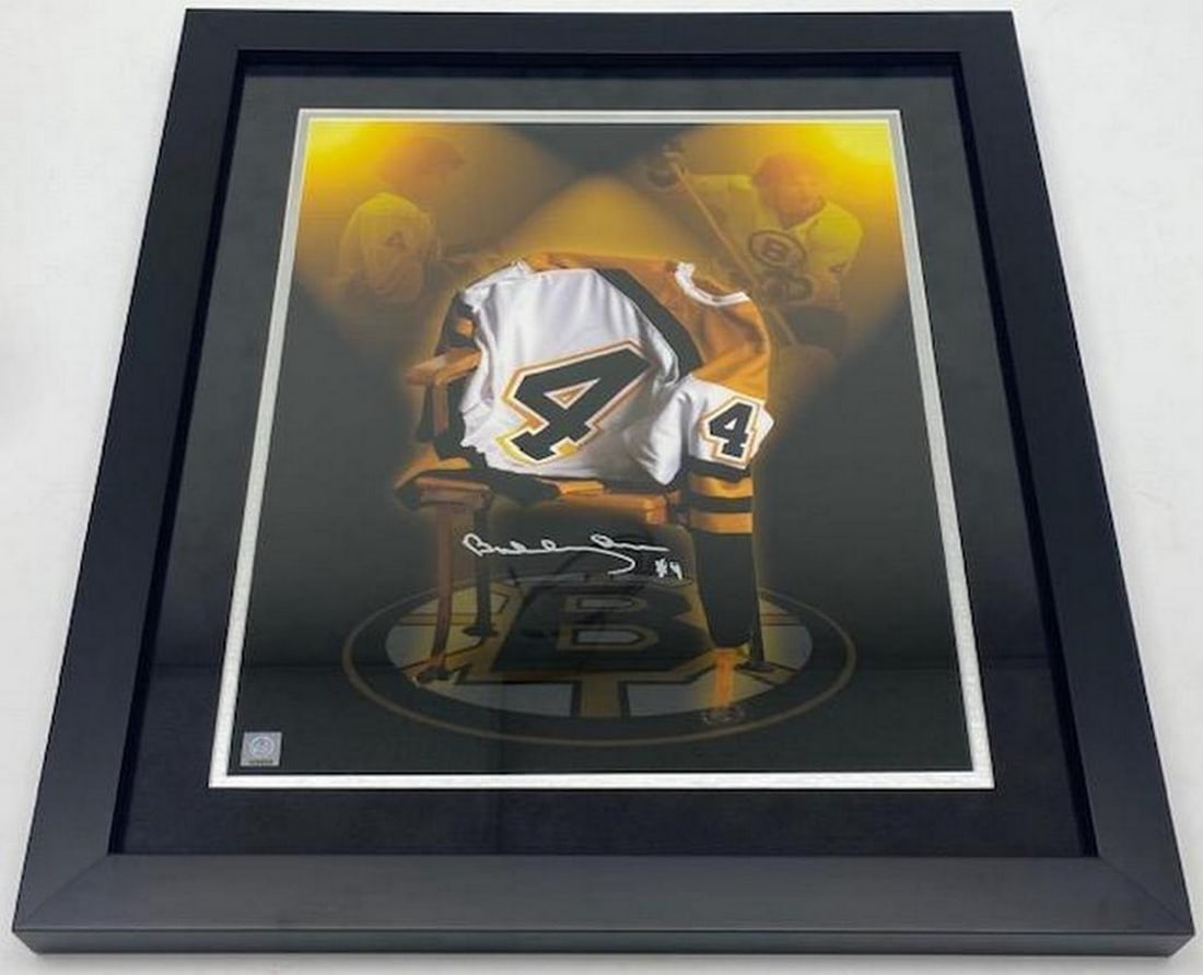 Authentic Bobby Orr Custom 20" x 24" Collage Autographed Picture With COA From GWN: Authentic Bobby Orr Custom 20" x 24" Collage Autographed Picture With COA From GWN. An Excellent Piece of Sports Memorabilia From A True Legend Of The Game. View Photos For Further Details.