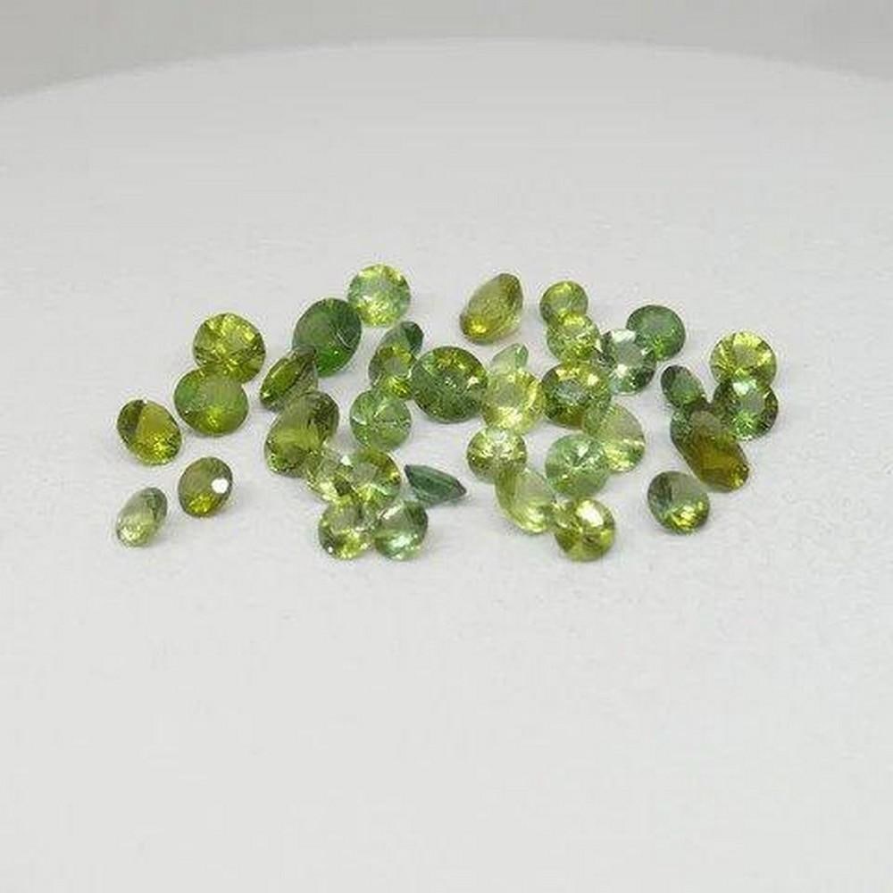 0.24ct Brilliant Cut Green Sapphire: Gem Type: Sapphire Number of Stones: 1 Shape: Round Cutting Style Crown: Brilliant Cut Cutting Style Pavilion: Step Cut Transparency: Transparent Clarity: Very Slightly Included: Eye Clean - Very