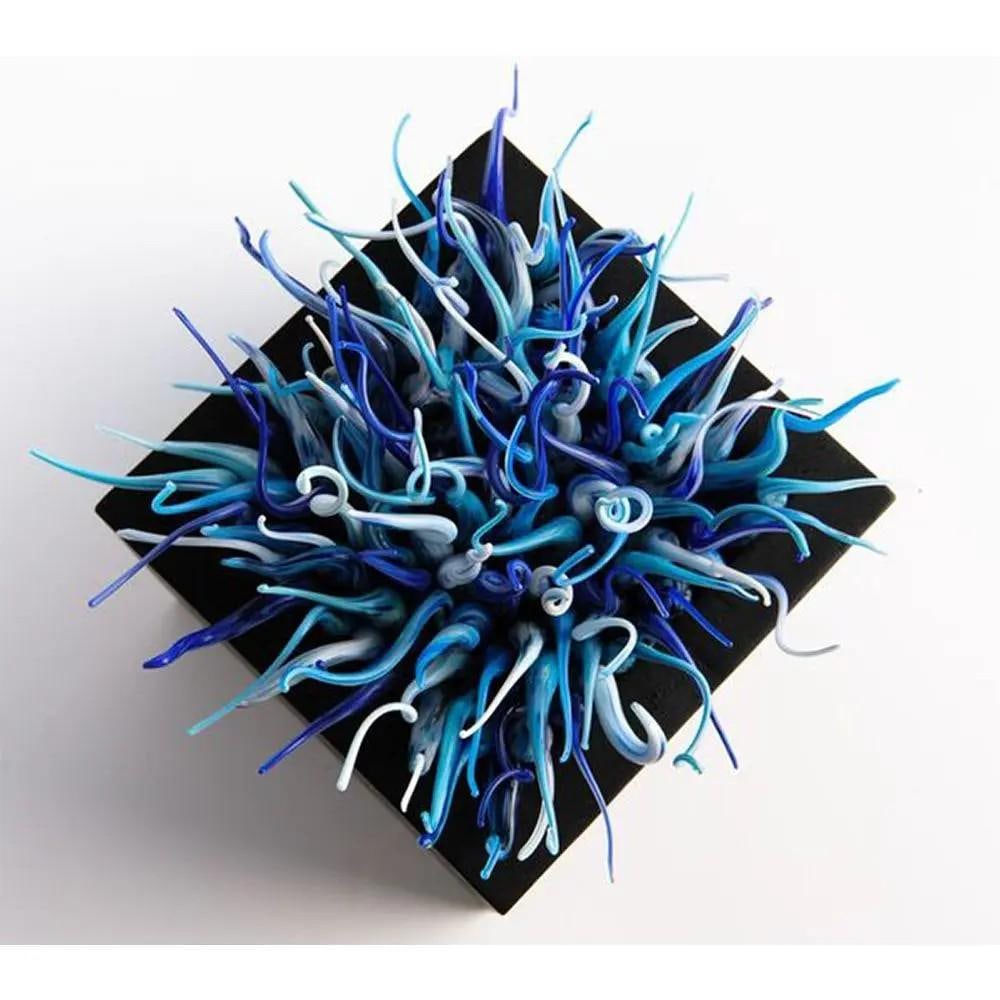 Antithesis' Flameworked Glass Art by Elena Fleury-Rojo: 'Antithesis' Flameworked Glass Art by Elena Fleury-Rojo The Antithesis collection of flameworked glass art explores the contrast between the fluid movement of coral and the stability of its ba