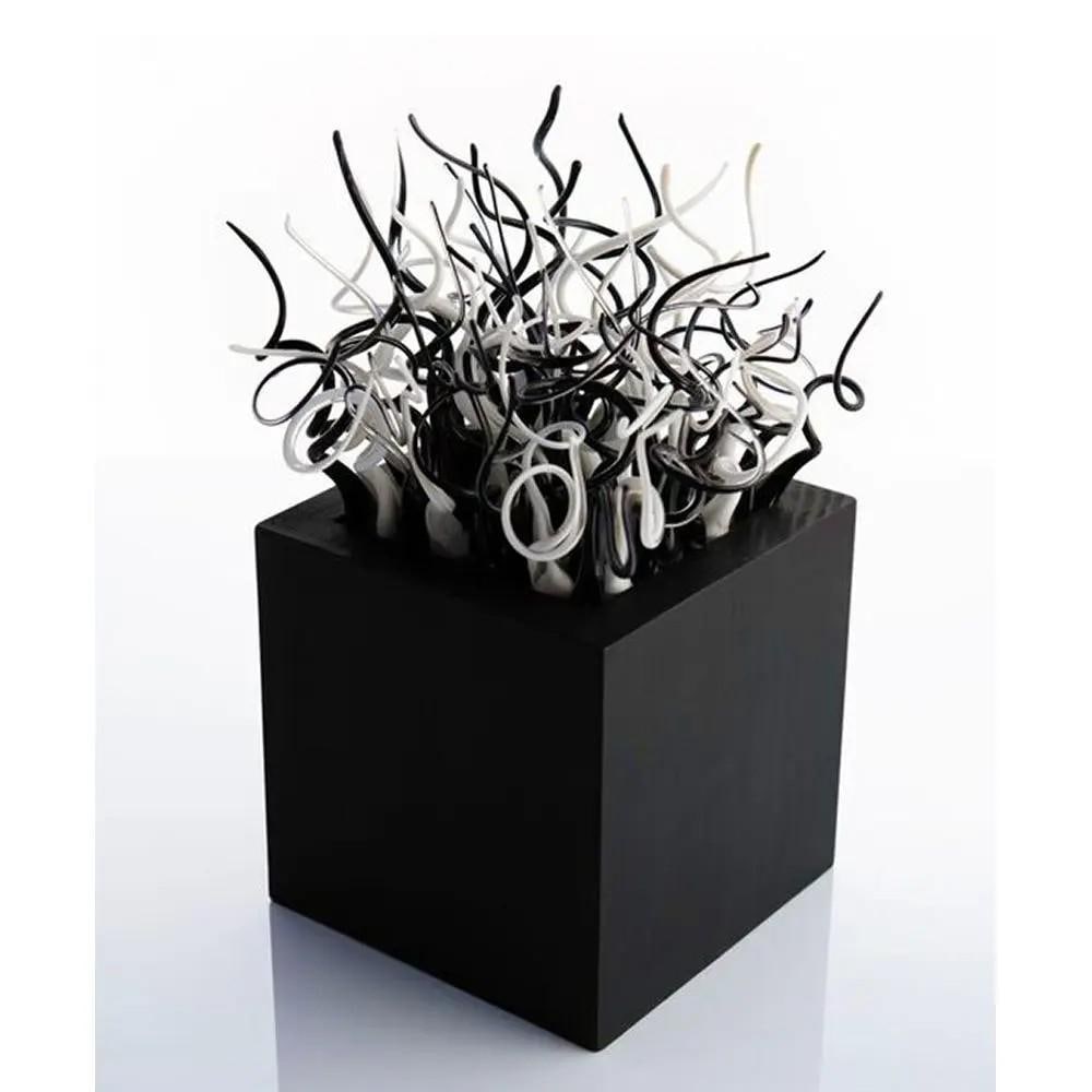 Antithesis' Monochrome Art Glass by Elena Fleury-Rojo: 'Antithesis' Monochrome Art Glass by Elena Fleury-Rojo Part of Elena Fleury-Rojo's Antithesis collection, this striking monochrome glass sculpture explores the contrast between the fluid m