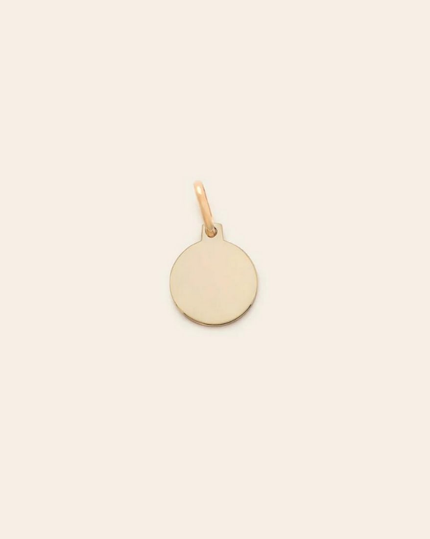 14k Vermeil Gold Plated Mini Disc Pendant: 14k Vermeil Gold Plated Mini Disc Pendant This 14k Vermeil Gold Plated Mini Disc Pendant is a minimalist treasure with timeless appeal. The sleek, polished disc design is crafted in 14k gold vermeil, 