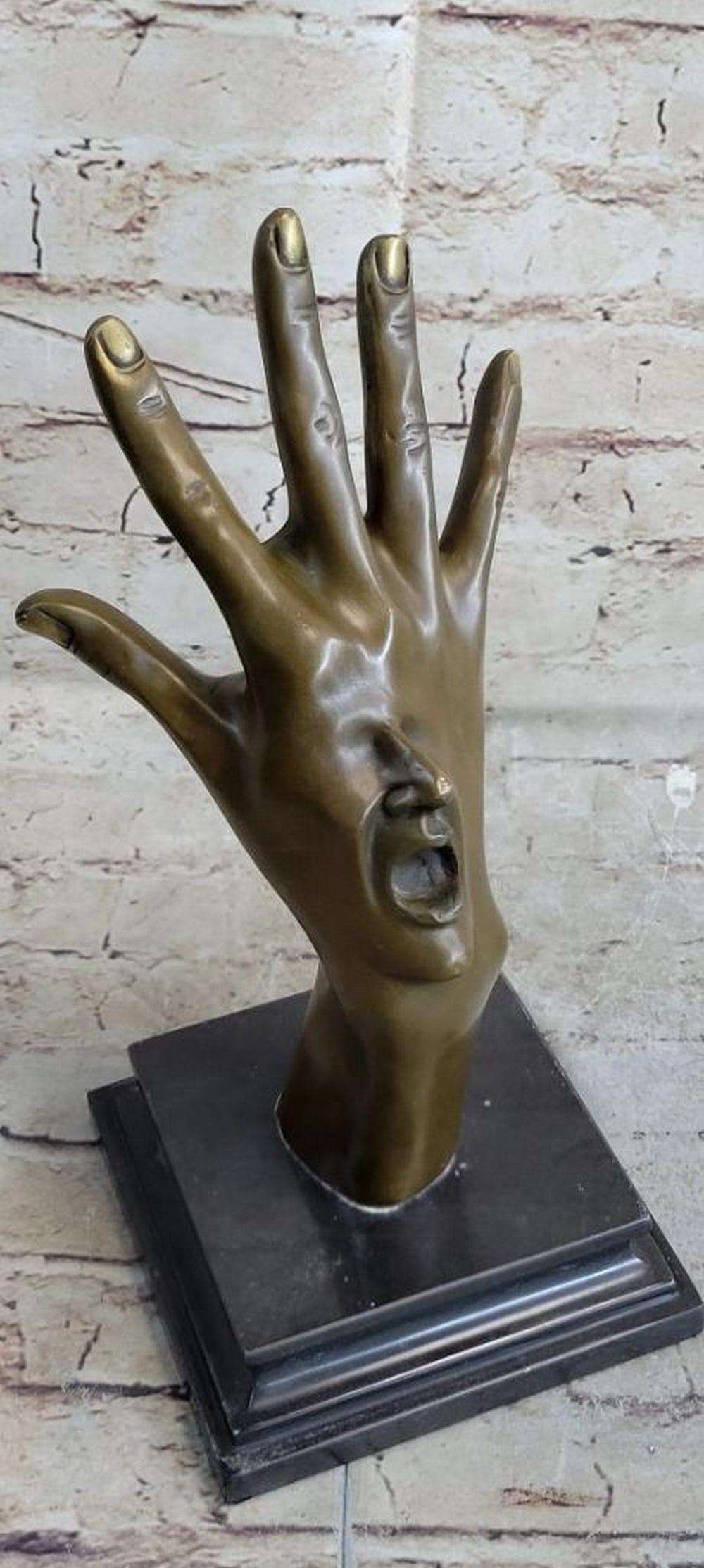 Surrealist Original Bronze Sculpture: Screaming Face on Back of Hand - 11" x 5.5": Surrealist Original Bronze Sculpture: Screaming Face on Back of Hand - 11" x 5.5" Presenting a captivating bronze sculpture by artist Milo, this artwork features a lifelike human hand and fore