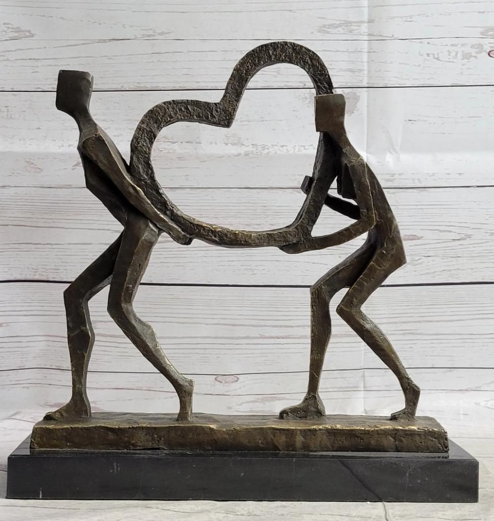Signed Francisci Original Lovers Carrying Heart Bronze Sculpture: Signed Francisci Original Lovers Carrying Heart Bronze Sculpture This exquisite bronze sculpture captures the essence of love and togetherness with its depiction of an elegant and slender abstract cou